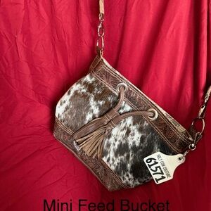 Holy Cow Mini Feed Bucket $275 Brown and White Cowhide Crossbody Bag